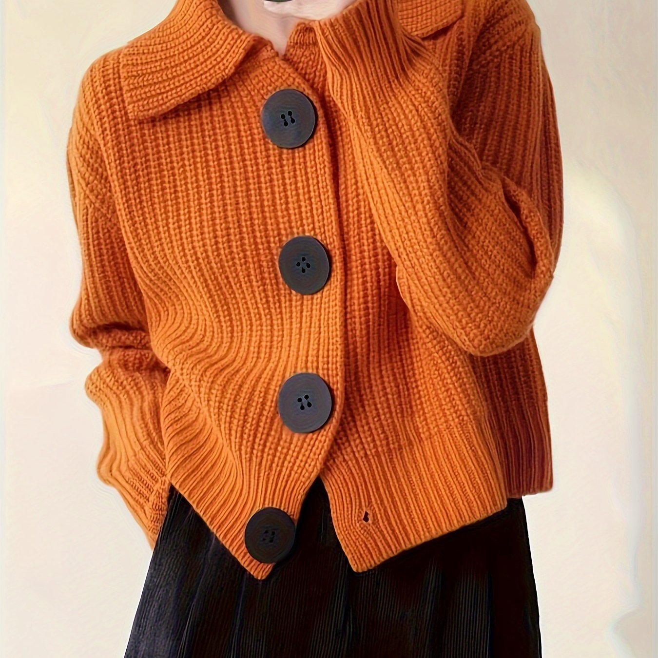 Targeted Development of a Casual Sweater Jacket, Featuring a Loose Lapel Knit Design And Large Button Details